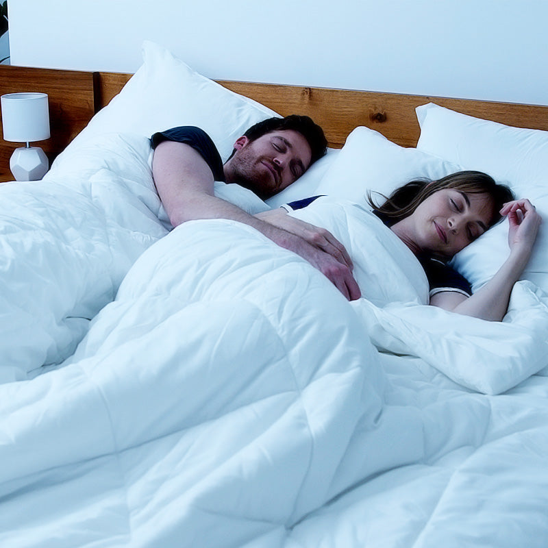 Couple using the ZQuiet Advance Mouthpiece sleeping peacefully